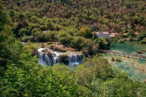 From Zadar: Krka National Park and Waterfalls Day Trip - Krka National Park walk: waterfalls plus a living guide
