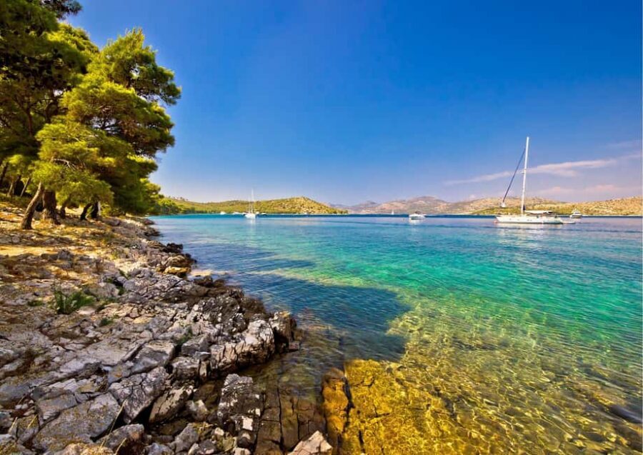 Zadar: Island Hopping Half-day Boat Tour with Snorkeling - The fishing village photo time and scenic cruising that breaks up the ride